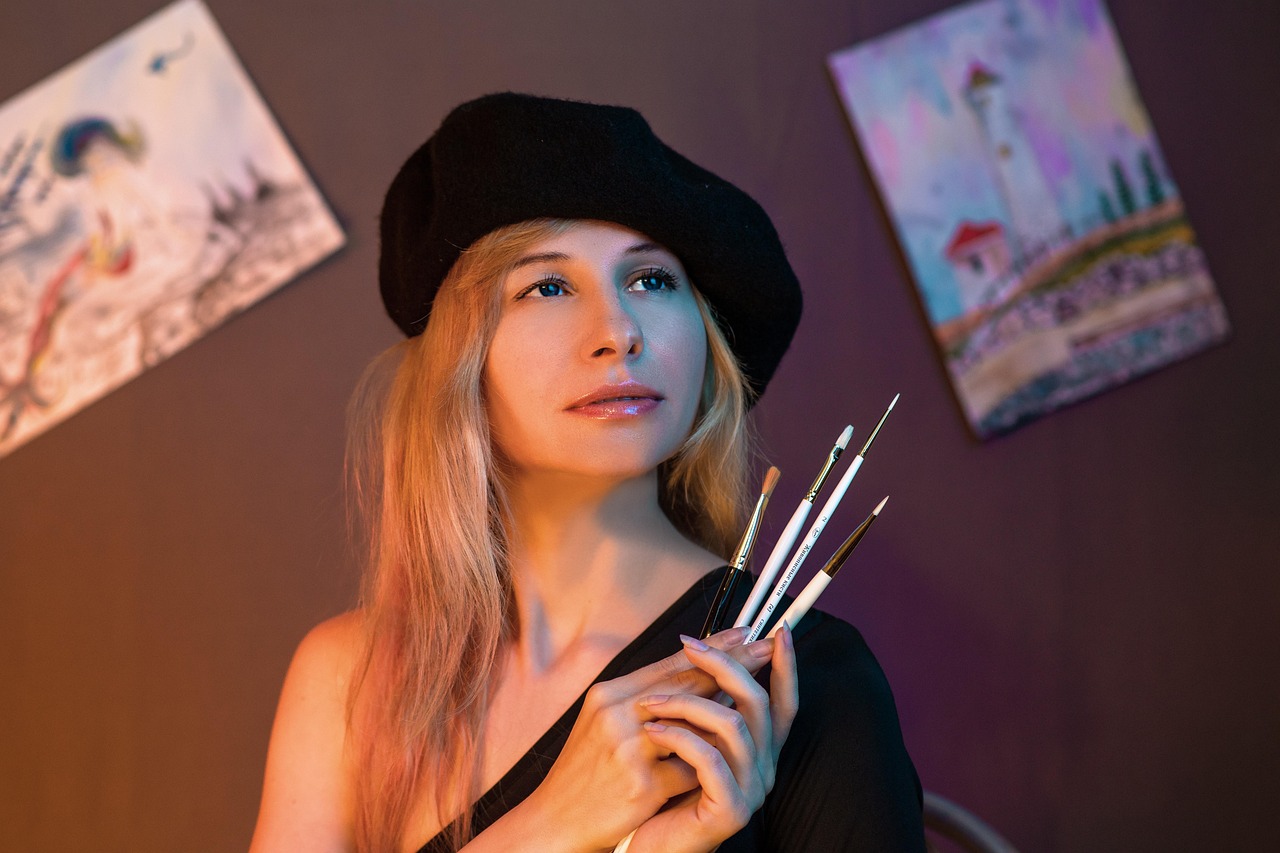 Artist preparing paints and tools